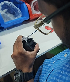 VOLT Charge technician working on a charging connector